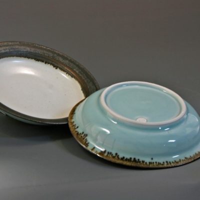 2 small celadon and white dishes with bronzed rims