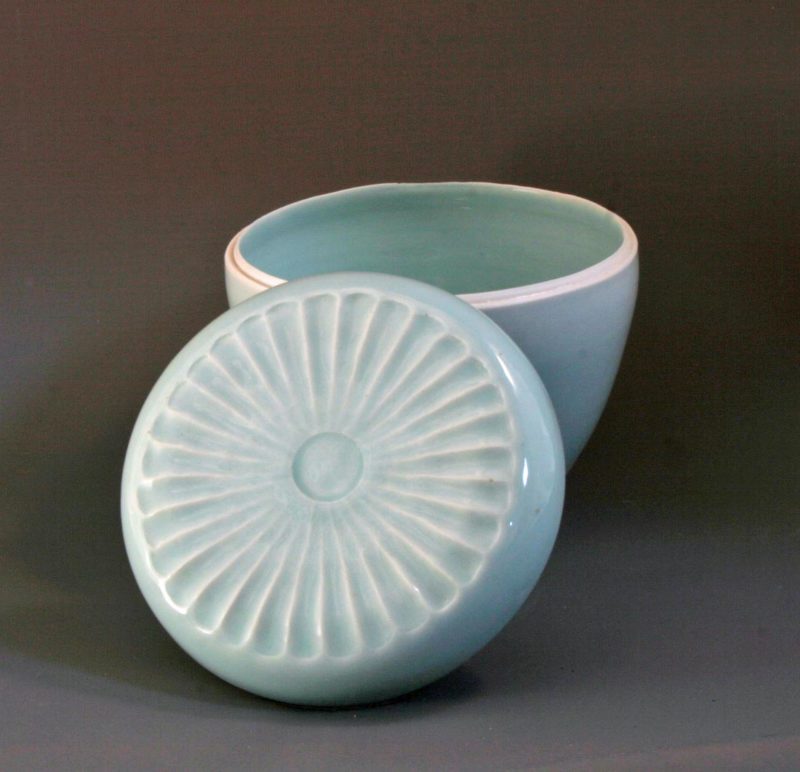 Celadon carved lidded pot