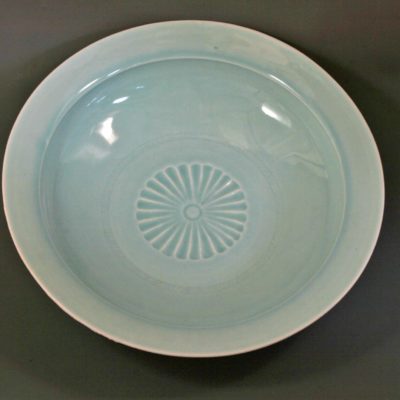 Large celadon carved dish