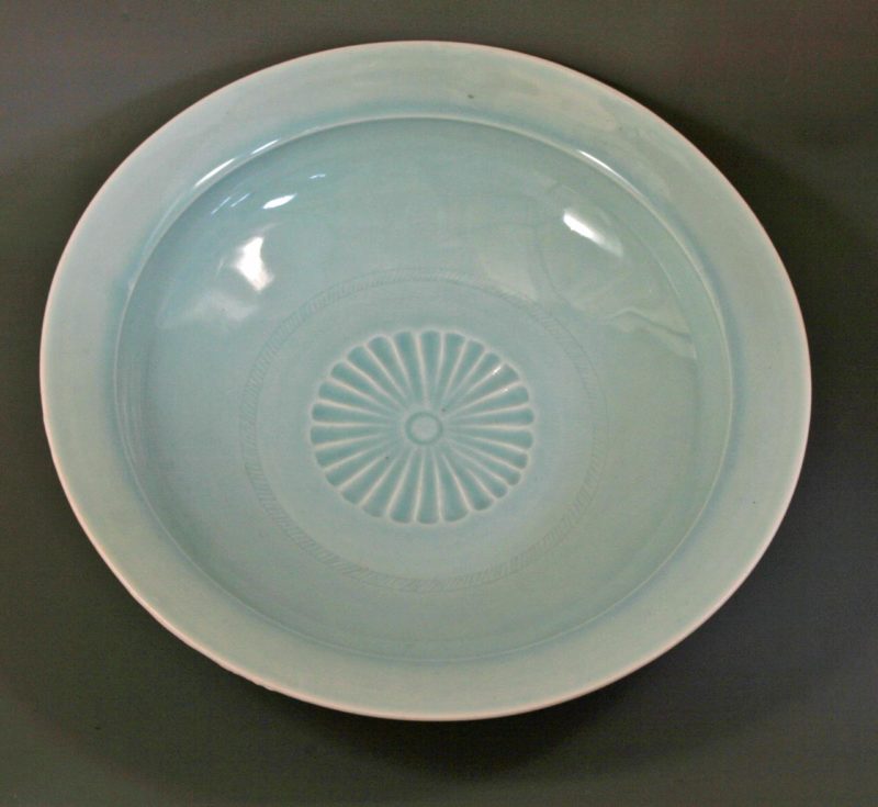 Large celadon carved dish