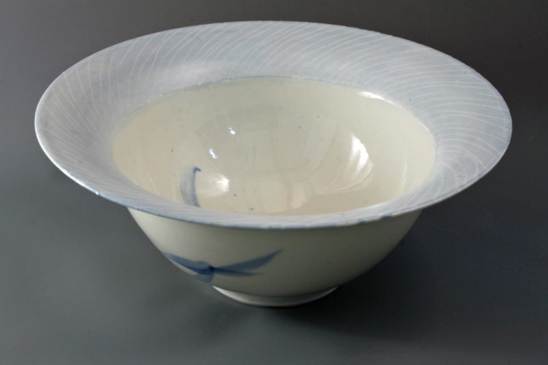 Large white bowl with scraffito and cobalt markings