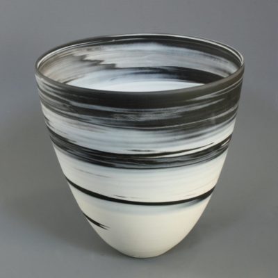 Large white on black agateware beaker 2