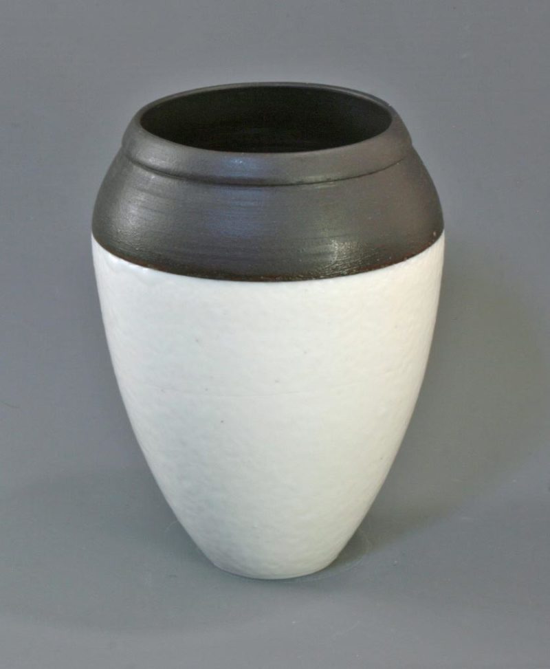 Small black and white ostrich shell glaze vase