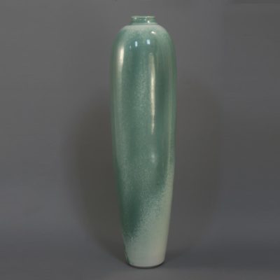 Tall green celadon vase